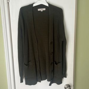 Worn but definitely life left! Olive green cardigan. Size medium